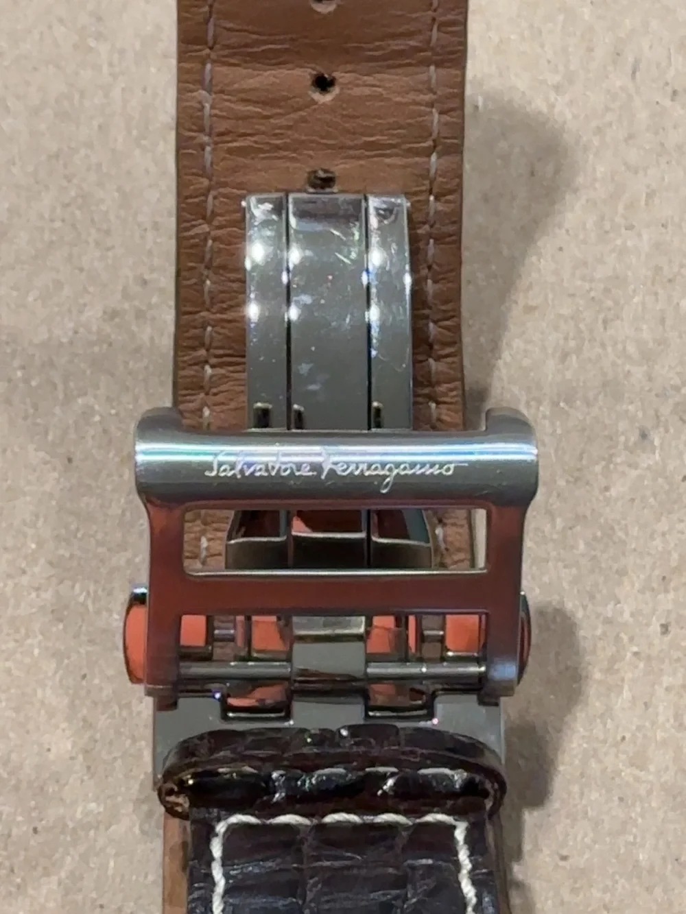 Salvatore Ferragamo Firenze Model K0810 Silver Case with Black Leather Strap.